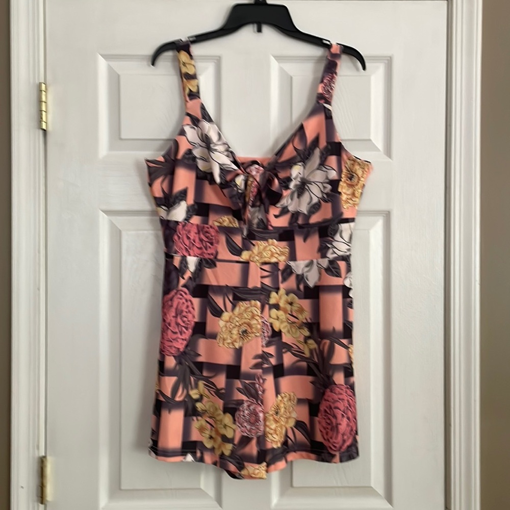 Amazon romper, side zipper, size extra large, tires in the front